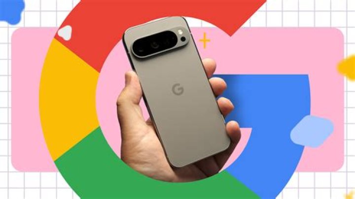 A hand holds the Google Pixel Buds 2020 true wireless earbuds case open to reveal the earbud.