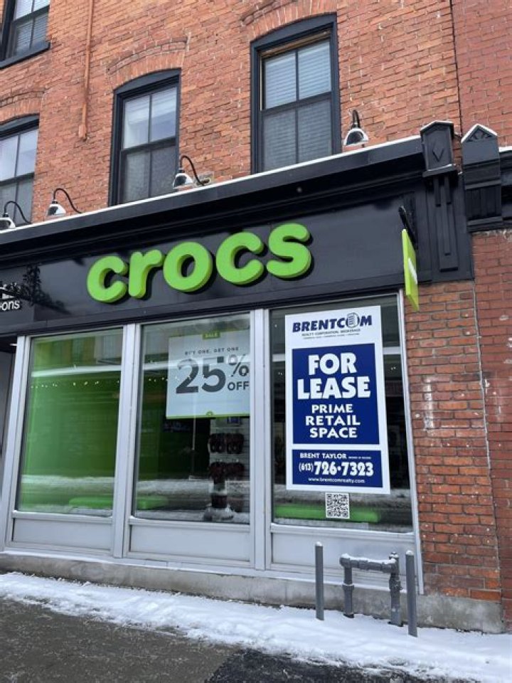 crocs closing stores laying off employees