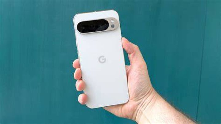 Google Pixel 5 holding in hand facing down 1