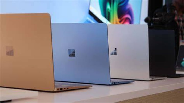 Microsoft Surface Duo closed with Pen and Earbuds