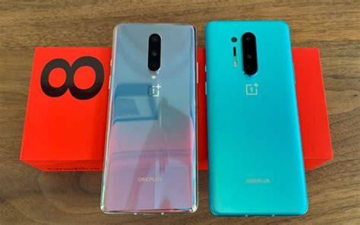 OnePlus 8 and 8 Pro in front of box OnePlus 8 and 8 Pro in front of box