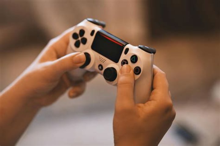 sony ps4 playstation 4 controller Person Holding Sony Ps4 Controller